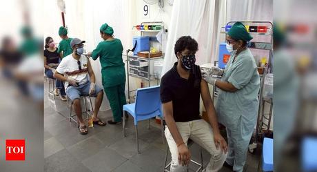 Covid-19: Amid shortage, token start to vaccination for 18+ - Times of India