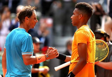 Felix Auger-Alliassime of Canada congratulates opponent, Rafael Nadal of Spain, during day five of the 2019 Mutua Madrid Open. 