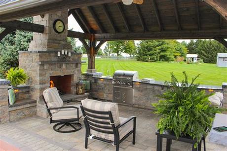 The fire pit has a simple finish that is attractive to match any outdoor living space decor. Outdoor Patio with Pavilion | See the Photos and Get a ...