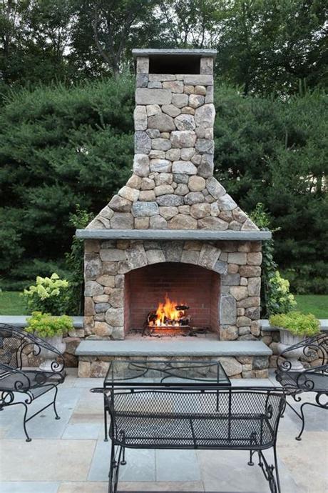 Impressive outdoor fireplace with seating. Outdoor Fireplace Built Freddys Landscape Company In ...