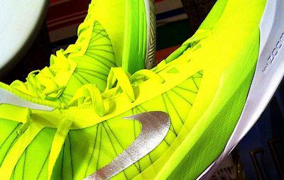 Why Are So Many Of The Olympic Athletes Wearing Bright Green Shoes?