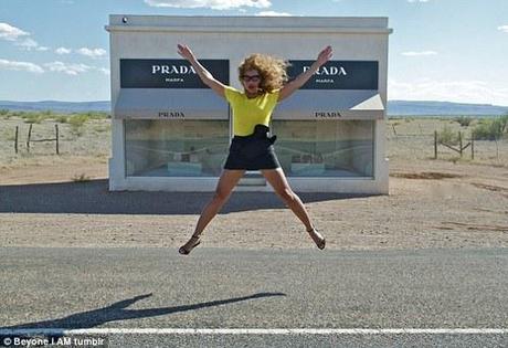 Thanks to some insider knowledge, I happen to know that Beyonce was just in Marfa, Texas, a sleeper town turned art world destination in recent years. 
I absolutely love that the Daily Mail has no idea that the picture above is from the photograph above shows B in front of the “Prada Marfa” installation by Elmgreen and Dragset, not an actual Prada store. Here’s their caption of the image:
Jump for joy! How exciting to be able to afford everything inside that branch of Prada.
If you’re not an avid follower of Beyonce’s Tumblr like me, you can check out the rest of the pictures from her trip with Solange in this hilariously misinformed Daily Mail post. My friend tells me that not only did she do the art shit, she also caused quite a ruckus by showing up at some field party a bunch of high school students were throwing. Yee-haw, Lady B!