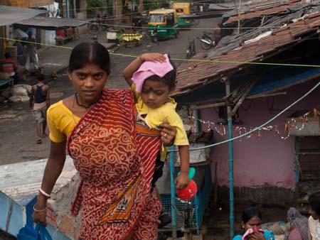 A mother and child along Rash Behari Ave