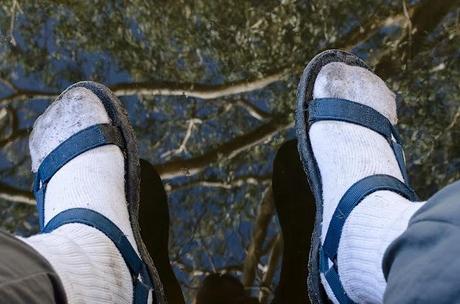teva sandals and reflection in water