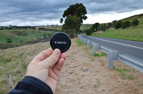 holding canon lens cap next to bulla-diggers rest road