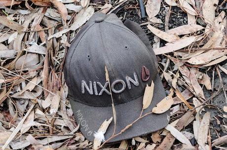 hat lying on the ground with motif nixon