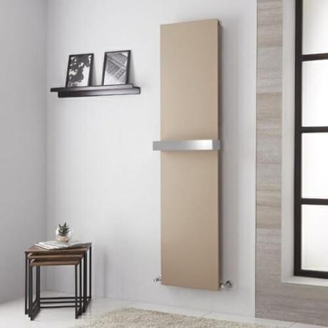 modern beige vertical radiator in a gray room