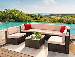 This contemporary style outdoor table and chairs are great to sit back and relax when the weather is good. Amazon Com Devoko 7 Pieces Outdoor Sectional Sofa Patio Furniture Sets Manual Weaving Wicker Rattan Patio Conversation Sets With Cushion And Glass Table Beige Garden Outdoor