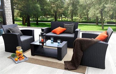 The functional dining table features a beautiful stamped pattern that provides a. Furniture Marvelous Backyard Design With Black Wicker ...