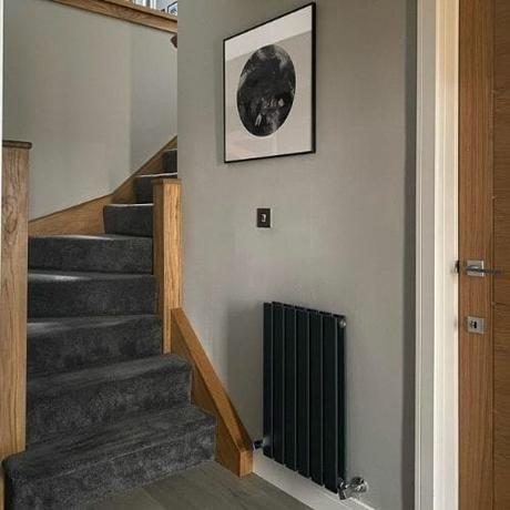 small anthracite radiator in a hallway