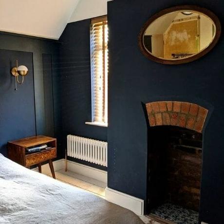 low level column radiator in a small bedroom