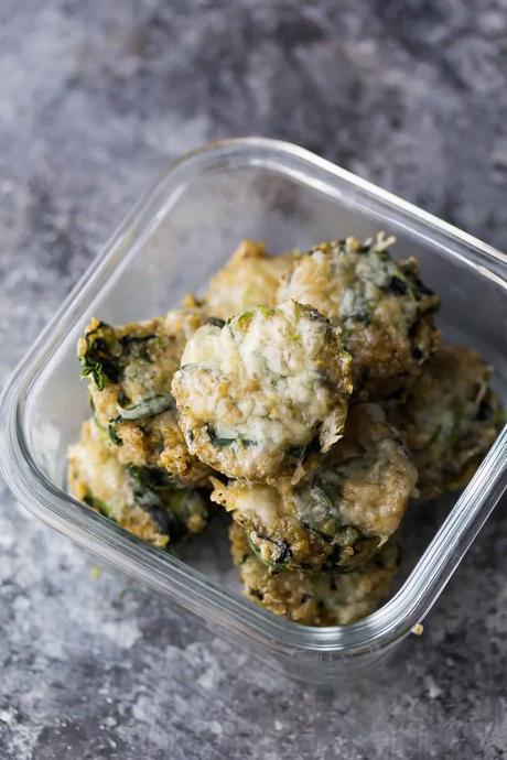 Cheesy Spinach Quinoa Cups in glass meal prep container