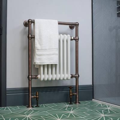 traditional milano elizabeth column heated towel rail in a bathroom