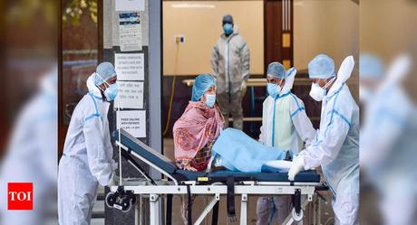 Covid-19: India records over 1 lakh new cases, lowest in 61 days - Times of India