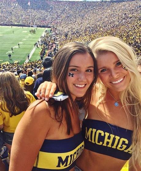 Mary from sportsanista nails this look with a black wrap skirt that looks casual—almost like she has a sweatshirt tied around her waist. UMich Game Day // Kinetic Society | College gameday ...