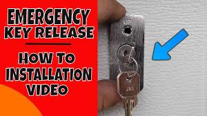 There are two bars running from the handle that release the door to be unlocked manually, and there is also a button on it which moves the bars across to lock the door. How To Install A Garage Door Emergency Key Release Video Youtube