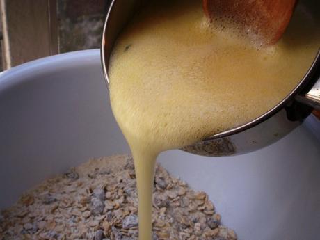 pouring butter mixture into bowl