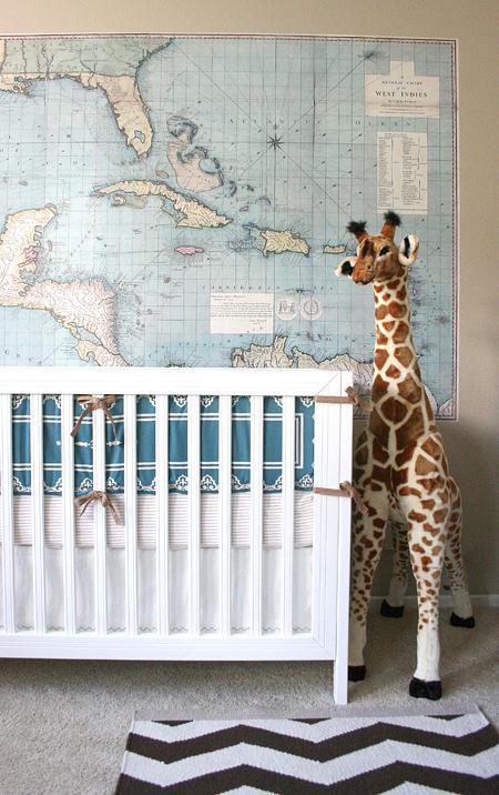 Jackson's nursery: crib, map, giraffe