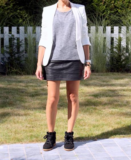 The leather skirt and the Boston sneakers