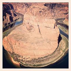 Horseshoe Bend, Page. You may notice tini-tiny white boat at the bottom of the picture. That'll give you the scale.
