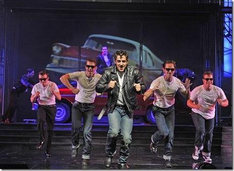 Adrian Aguilar (center) plays Kenickie, rockin’ ‘n’ rollin’ with his fellow Rydell High greasers (back, from left) Doody (Sean Effinger-Dean), Sonny (Creg Sclavi), Danny (Skyler Adams) and Roger (J. Michael Finley) in Grease. (photo credit: Liz Lauren)