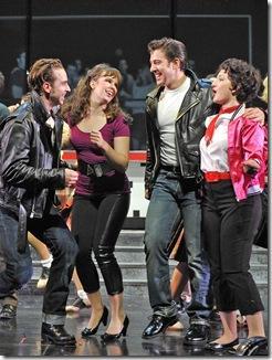 (from left) Skyler Adams plays Danny, Emma Ritchie is Sandy, Adrian Aguilar plays Kenickie and Jessica Kingsdale is Rizzo in Paramount Theatre’s 2012-13 Broadway series season opener Grease. (photo credit: Liz Lauren)