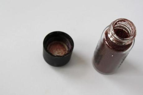 MAC Pigment In Reflects Blackened Red.