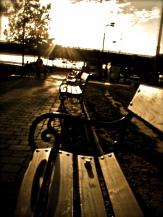 Sunset on benches by the banks of the Danube