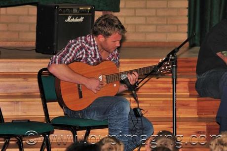 Jason Hartman with his guitar