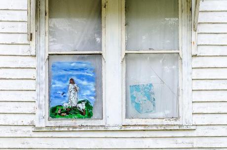 jesus mural on house window