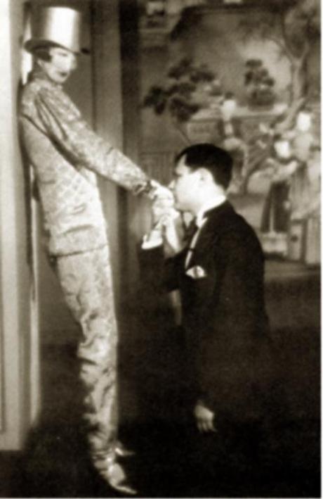 Last night I had paralyzing zombie apocalypse nightmares. The zombies moved really fast, like vampires, and also ate my friends and family. Whenever I’d manage to fall back asleep after waking myself up from one, I’d just go right back to another, in a different landscape: the tiered streets that frequently appear in my dreams as “London”; a Victorian house during a pizza party; the living room in my apartment, where the zombies were coming in through the back window we keep open all night.
I am exhausted, at a loss for words, which is really just a continuation of the state I’ve been in for the past week. I blame the gigantic orange moon that loomed last night over the BQE. Caleb also had strange dreams, as did a friend who I just ran into on the street. I was going to move the Jeep, after a cop came to our house, and said that I needed to find a new parking space, or some idiot driving a tractor trailer too large for our block was going to crush it into mangled pieces. 
Anyway, where am I? Oh yes, Nancy Cunard. Somehow I managed to drop her into a story about “outrageous runways” this morning. Trés jolie. 