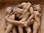 One of the many erotic carvings at the Lakshmana Temple