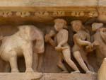Sculpture of the sculptors carving an elephant at the Lakshmana Temple