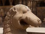 Head of lion with the Devi Jagadambi Temple in the background