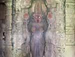In the sanctum an enormous image of the multi-armed goddess Devi