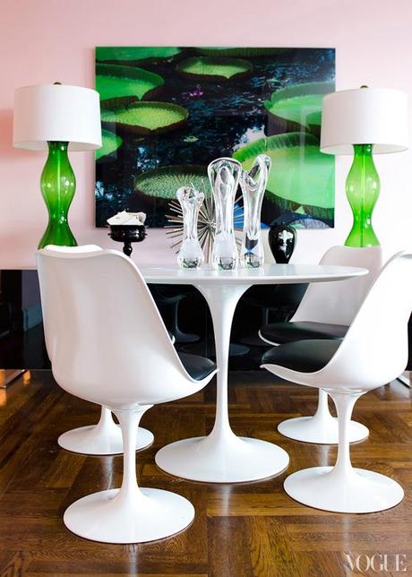 APT with LSD Alina Cho, pink walls, green art lamps, Saarinen table, chairs