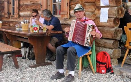 Being serenaded while eating my dumplings at the Gostner Mountain Hut in Alpe di Siusi.
