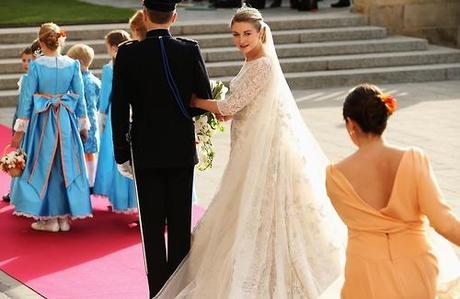 I had no idea, but there was a royal wedding in Luxembourg this past weekend. Where is Luxembourg, you might ask? I think in one of the trenches on the Maginot Line, but I can’t be sure.
The marriage was between Prince Guillame and Countess Stéphanie Lannoy. She wore an Elie Saab creation that was described as thus:
“The dress featured three-quarter sleeves, a neckline which was high in the front and dipped in the back, and a belted waist above a full skirt and 4.5 meter train. Masses of fabric went into this creation: 70 meters of silk crepe and tulle for the lining, plus another 30 meters of satin organza, 50 meters of Chantilly lace, and 40 meters of Calais lace. More silk tulle was used for the veil. The leafy pattern embellished all over the ensemble included 50,000 pearls, 80,000 crystals, and 10,000 meters of silver embroidery thread.” 
Holy shit, how do I marry a prince? Perhaps by kidnapping him and stealing all his pearls?
It’s definitely my favorite royal wedding dress in recent memory—decadent, but also modern, and with a trail that could sweep up a flood. Blew Kate Middleton’s Alexander McQueen out of the water.
To read more about the wedding, click here. And also here. 