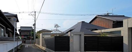 Broken pitched roof house by NKS architects
