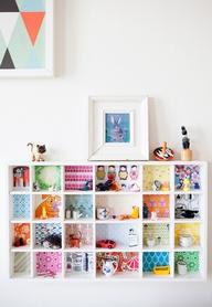 #DIY: Paper the back of shelves with wrapping paper, wallpaper...