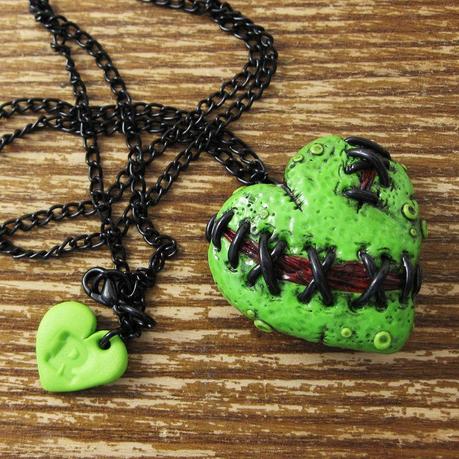 Stitched zombie heart locket by rapscalliondesign on Etsy.com