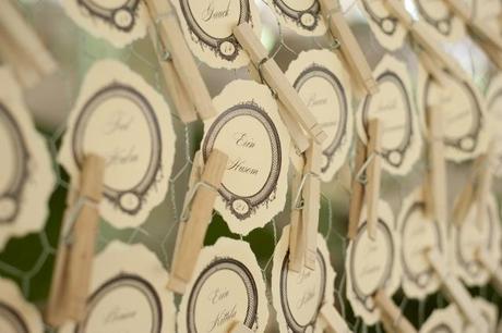 table place cards held with clothes pins