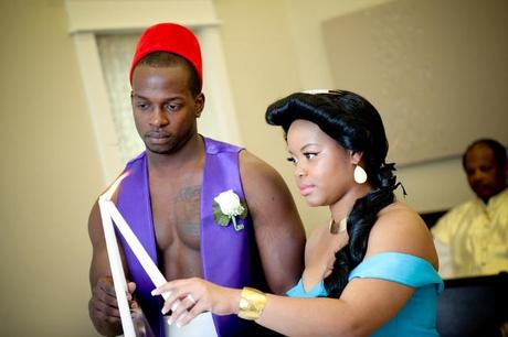 costume wedding with bride and groom as Aladdin and Jasmine