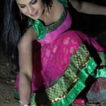 Veena Malik lighting an anar