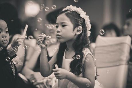 wedding reception with flower girl and bubbles