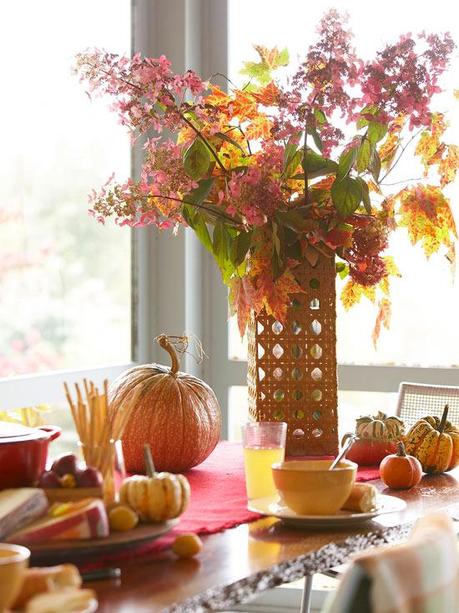 Thanksgiving decorating with candles and objects in nature