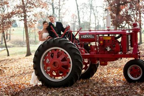 Wedding photography bride and groom on red tractor