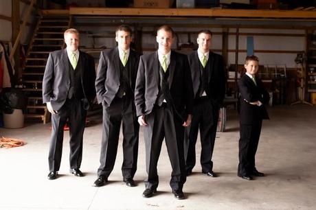 barn location with groom and groomsmen