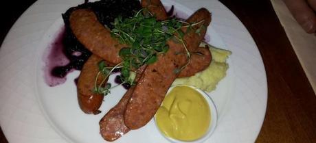 Spicy sausages served with red cabbage, mustard and potato purè @ Café Skansen