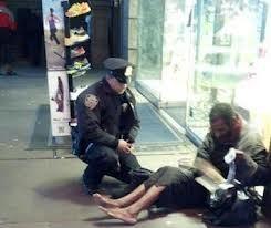 Video of NYPD officer giving homeless man shoes goes viral
